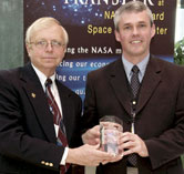 Goddard’s Center Director Dr. Edward Weiler presented OTT’s 2005 Kerley Award to Peter Shirron