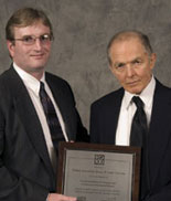 John Vranish receiving award