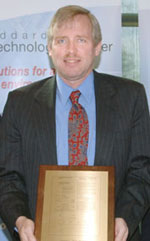 James Tilton receiving award